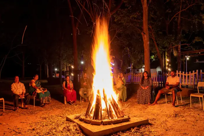 Guests around the evening campfire